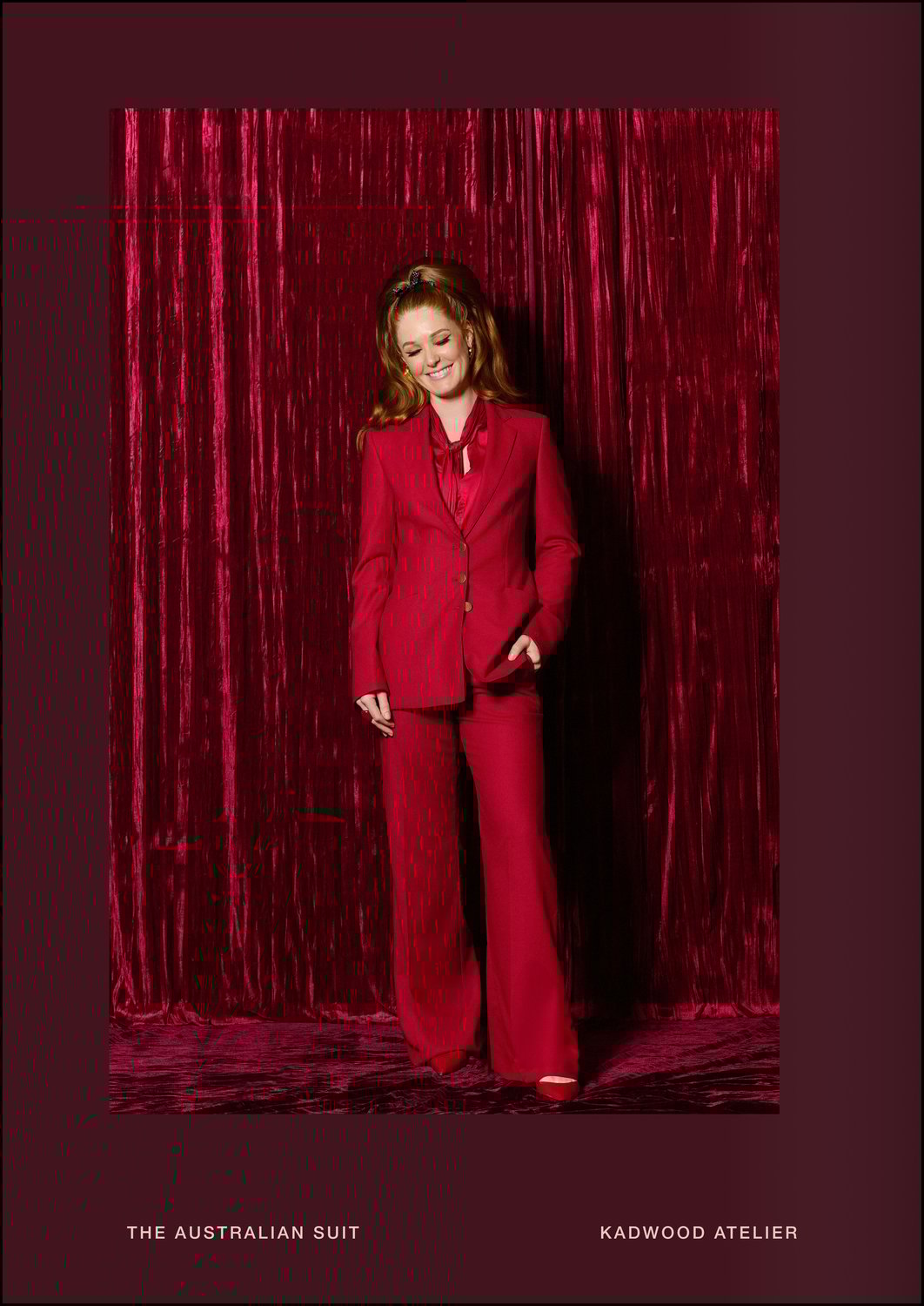 The Australian Suit - Full length portrait of a woman wearing The Australian Suit in crimson solid crepe by Holland and Sherry from Yorkshire UK bespoke made to measure in 100 percent wool crepe by Kadwood Atelier Sydney’s only exclusively for women tailor