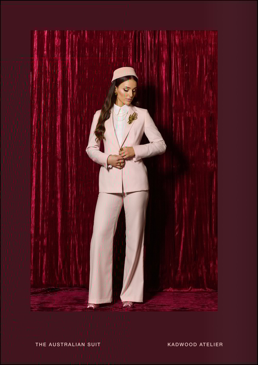 Model wearing pastel pink faille weave suit from The Australian Suit collection by Kadwood Atelier bespoke made to measure in 100 percent Australian Merino wool for executive women